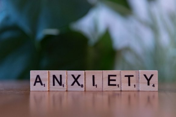 Anxiety spelt out in letters on pink blocks